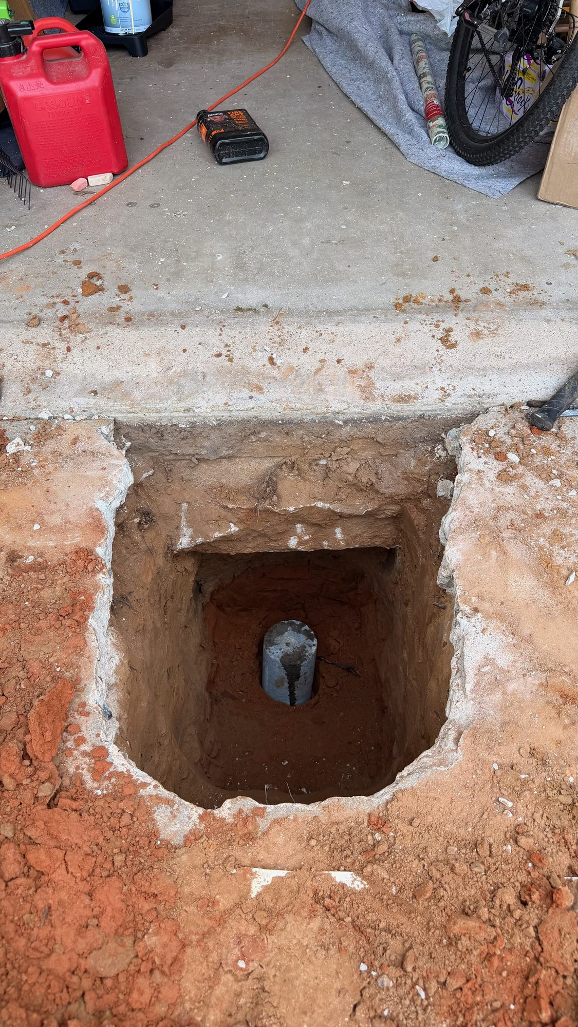 Pier in slab hole, Imperial Foundation Repair job site in North Texas