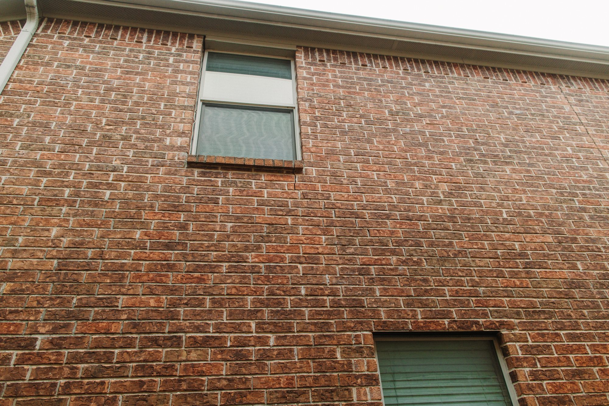 Brick wall window hairline, Imperial Foundation Repair job site in North Texas