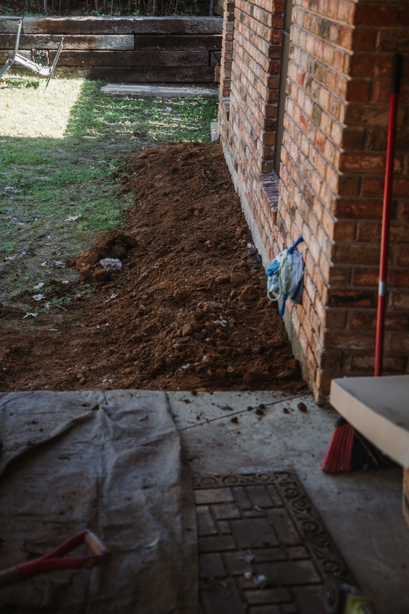 Excavation backyard corner, Imperial Foundation Repair job site in North Texas