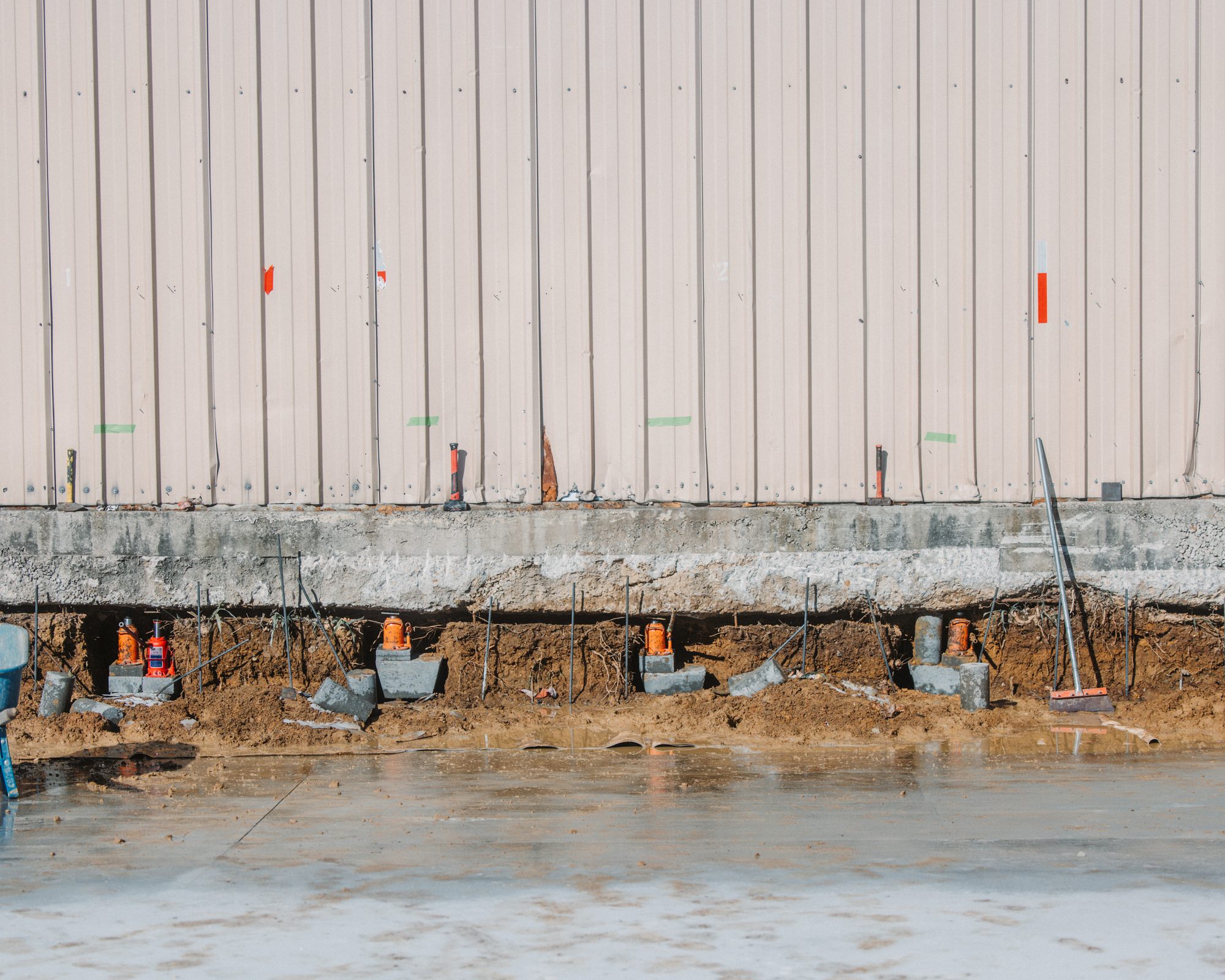 Warehouse pier line, Imperial Foundation Repair job site in North Texas