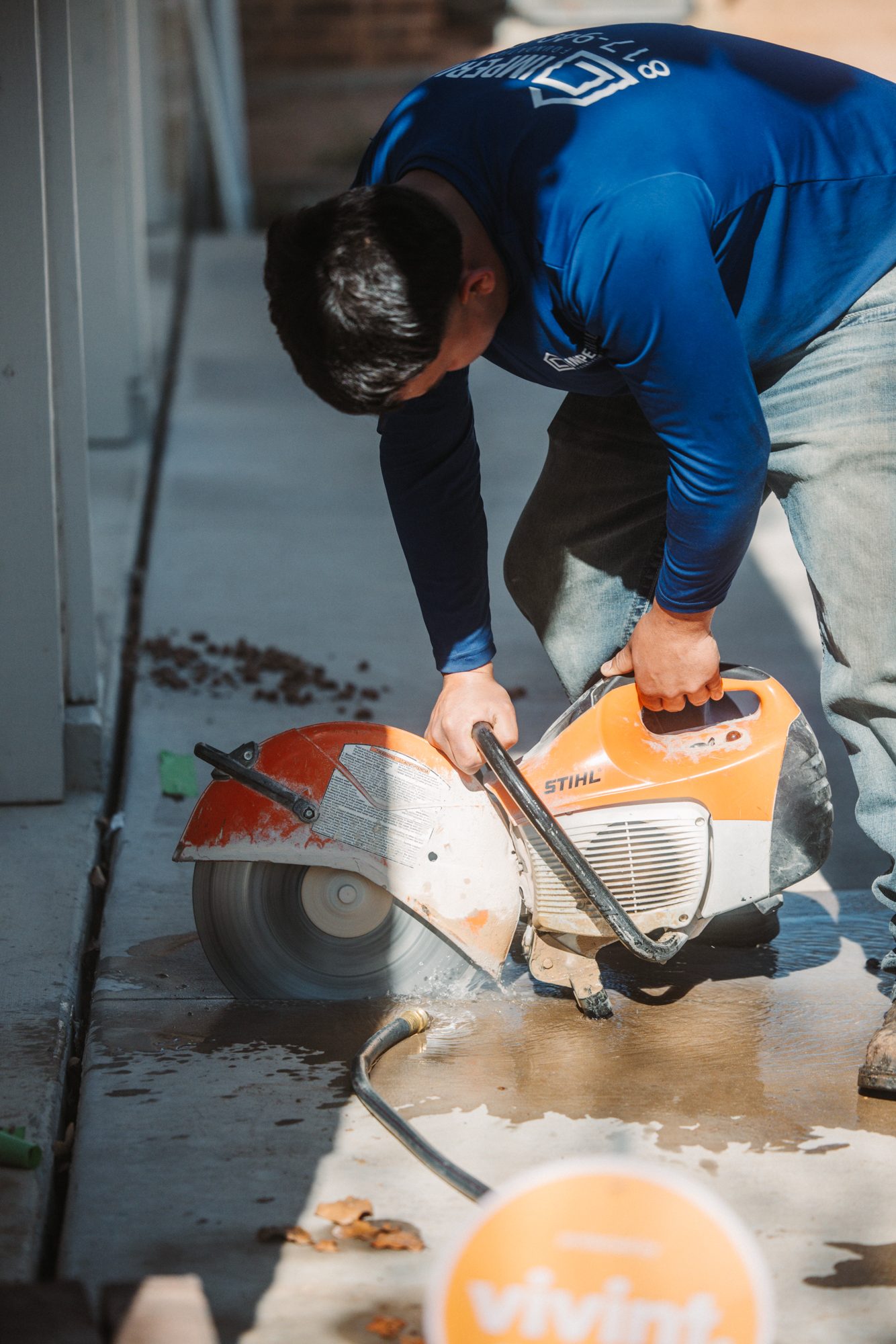 Concrete cutoff saw, Imperial Foundation Repair job site in North Texas